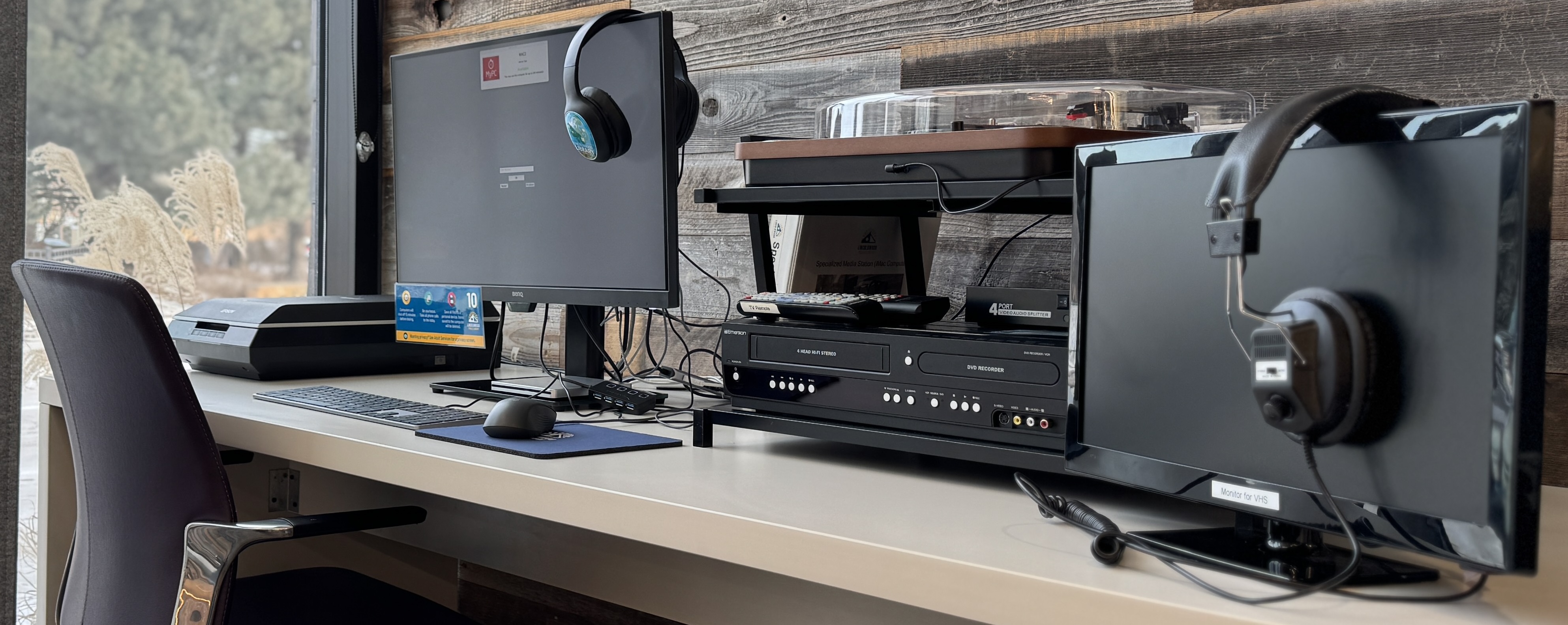 Scanner, two computer screens, vinyl digitizer, VHS player and digitizer